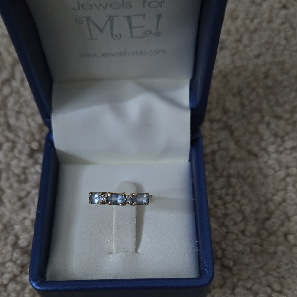 Gold Band Ring with Pale Blue Gemstones
